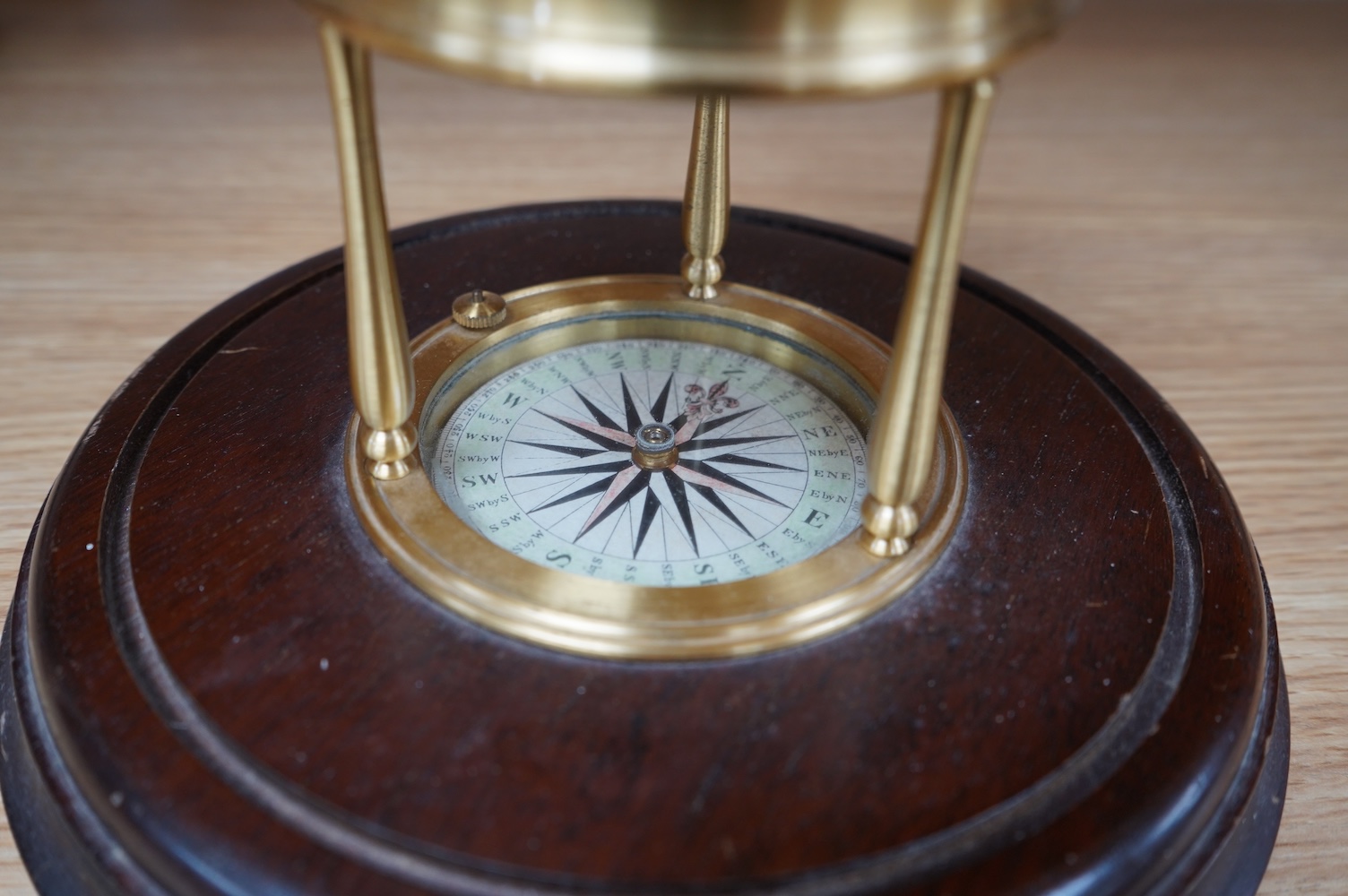 A reproduction brass Astro Visualizer designed by Barrie J Tonkinson and made in England by Culpepper Instruments Ltd., on a hardwood base, 24cm high, with user manual. Condition - fair to good.